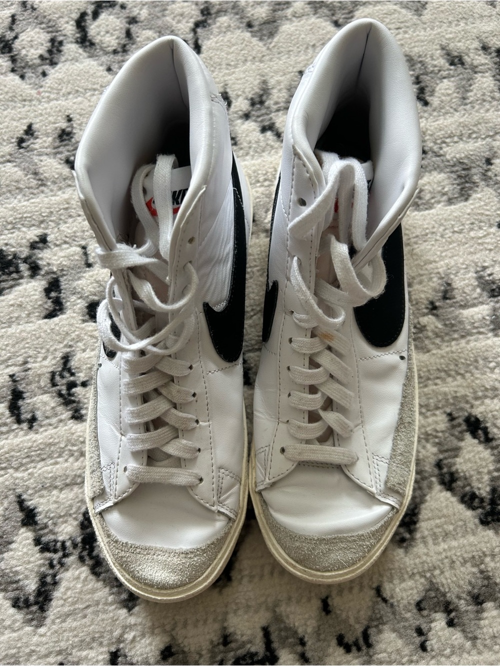 Nike White High-Top Sneakers with Black Swoosh - Picture 2 of 4